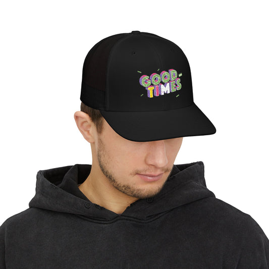 Person wearing a black cap with 'Good Times' text, white background