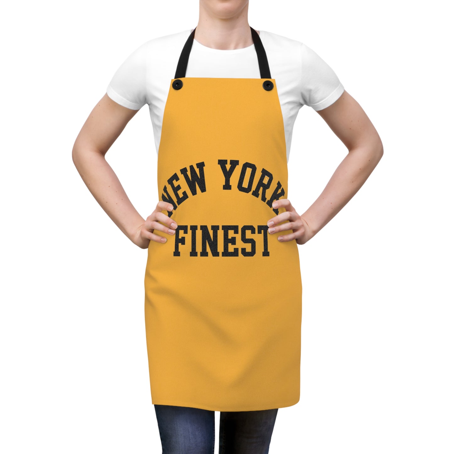 Person wearing a yellow apron with 'New York Finest' text on a white background