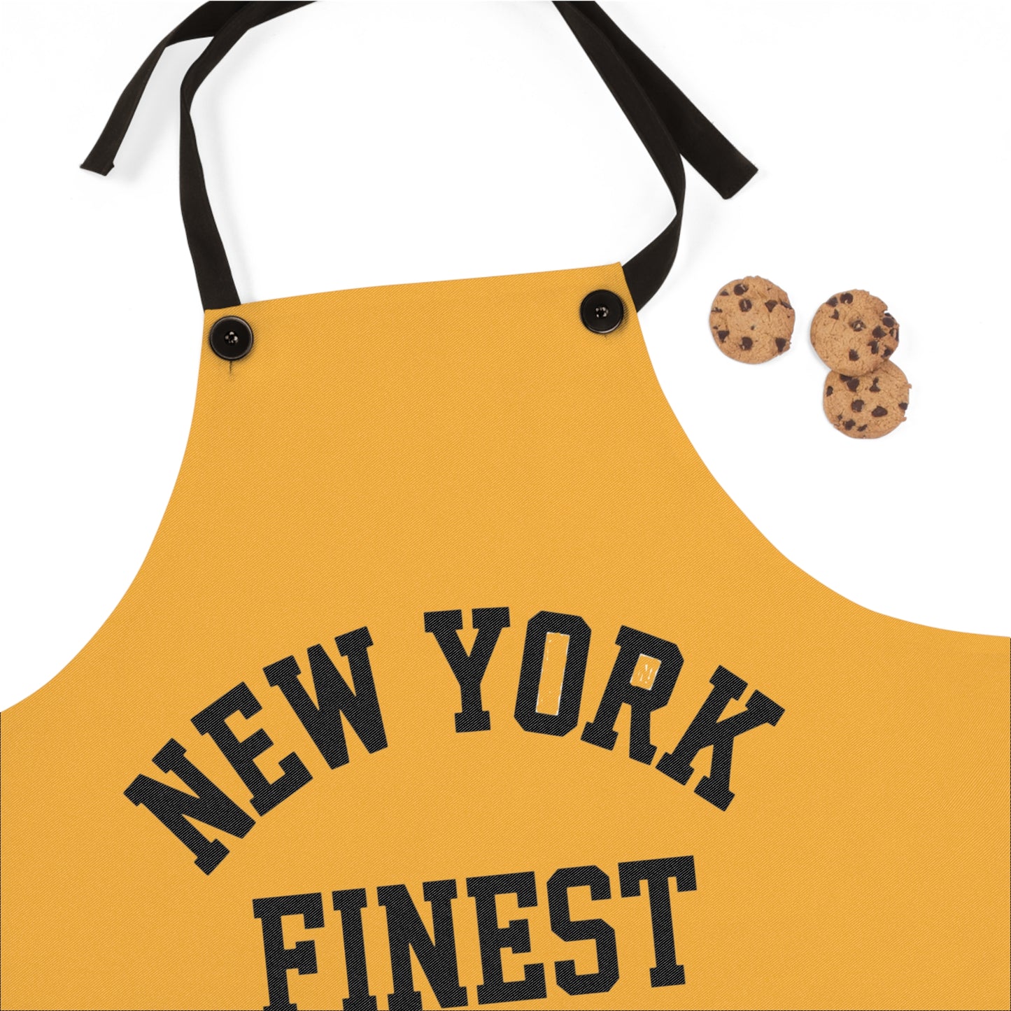 Yellow apron with 'New York Finest' text on a white background