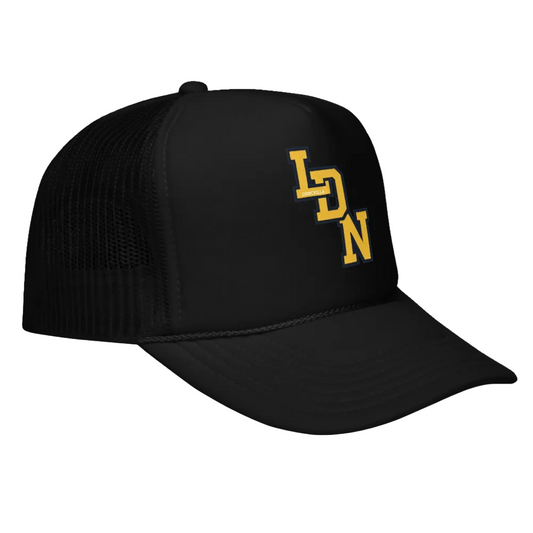 Black trucker cap with yellow logo on a white background