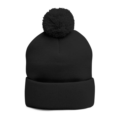 Black beanie with pom-pom on a white background