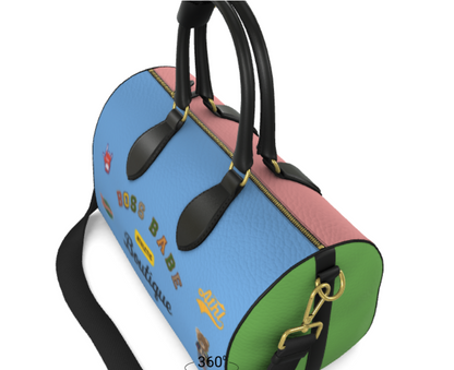 Colorful handbag with black handles and decorative elements on a white background