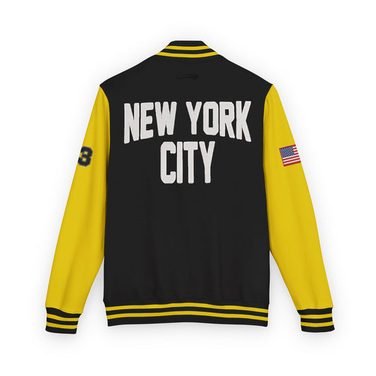 Black and yellow varsity jacket with 'New York City' text on a white background