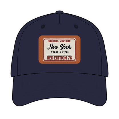 Navy blue cap with a vintage-style label on a white background