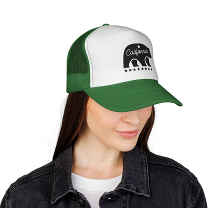 Person wearing a green and white cap with 'California' and a bear graphic on a white background