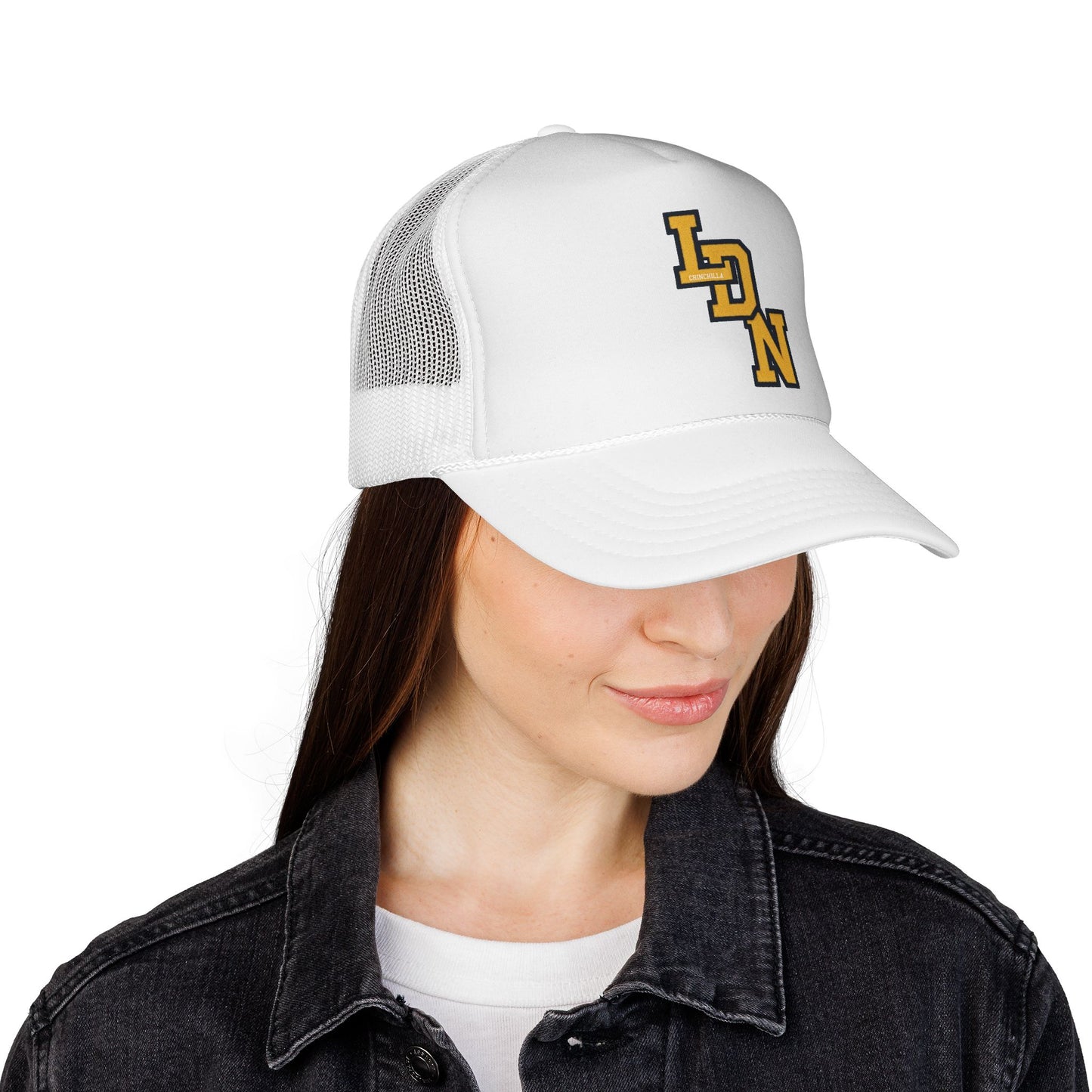 Person wearing a white trucker cap with a logo on a white background