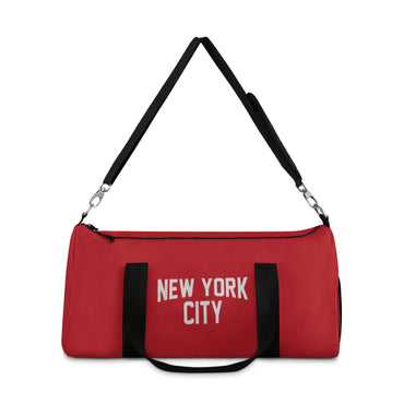 Red duffel bag with 'New York City' text on a white background