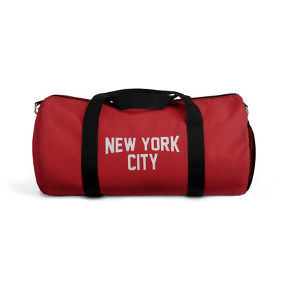 Red duffel bag with 'New York City' text on a white background