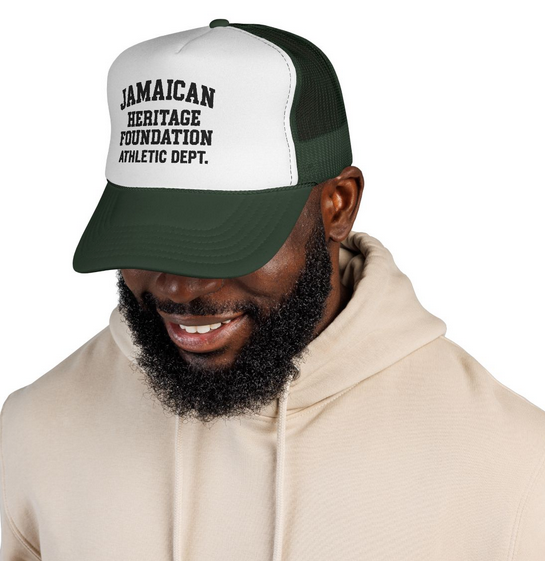Man wearing a cap with 'Jamaican Heritage Foundation Athletic Dept.' text on a white background