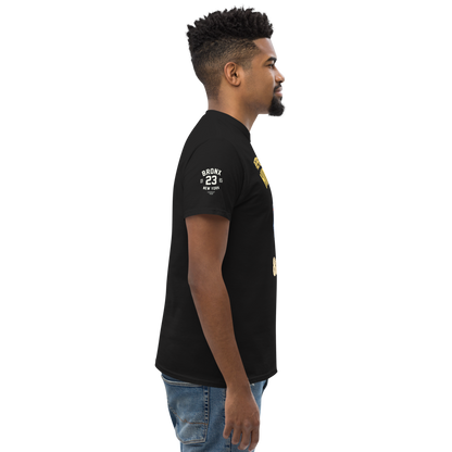 Man wearing a black t-shirt with text and graphics on a white background