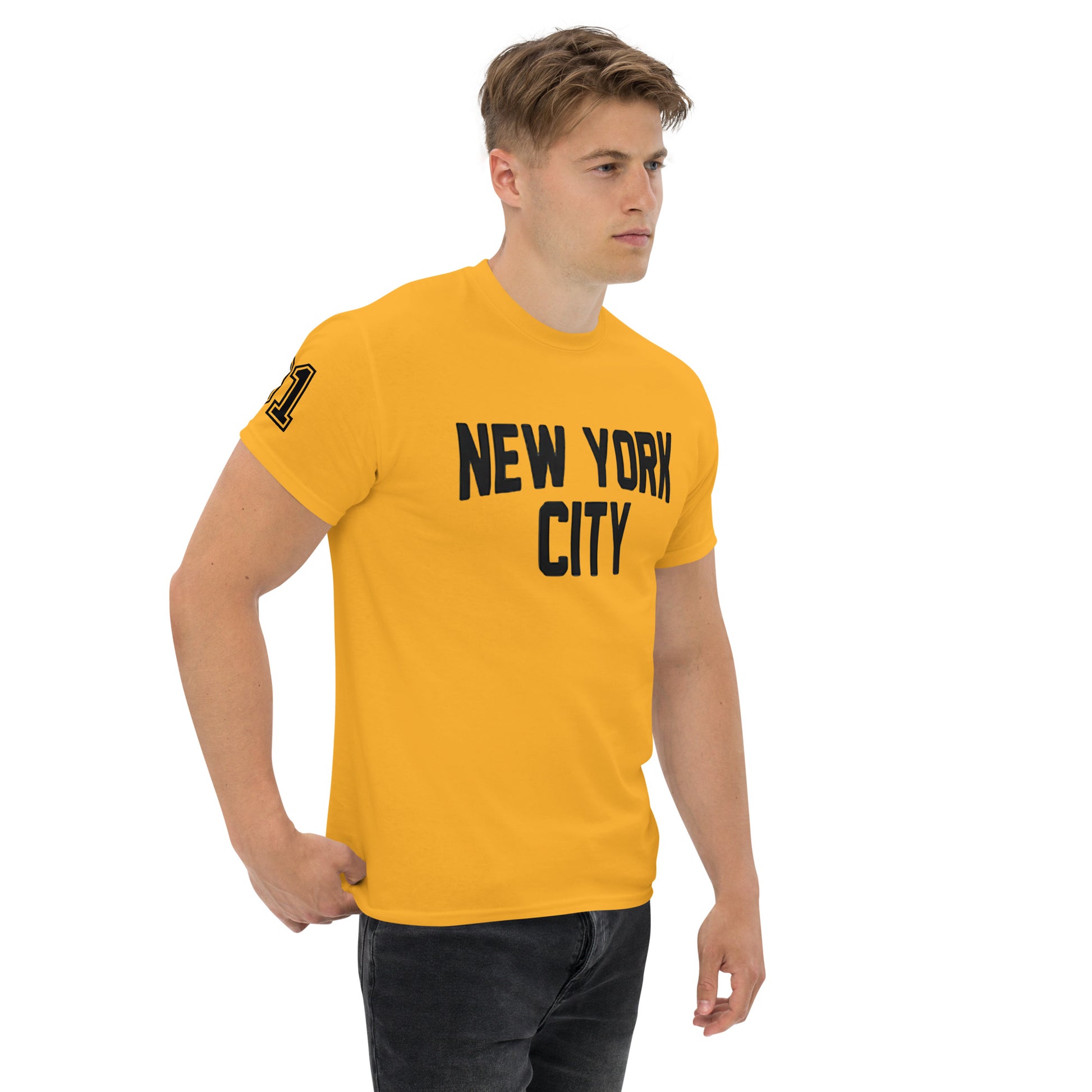 Man wearing a yellow t-shirt with 'New York City' text on a white background
