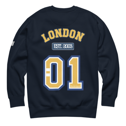 Navy blue sweatshirt with 'London Est. 2003' printed in yellow and white on a white background