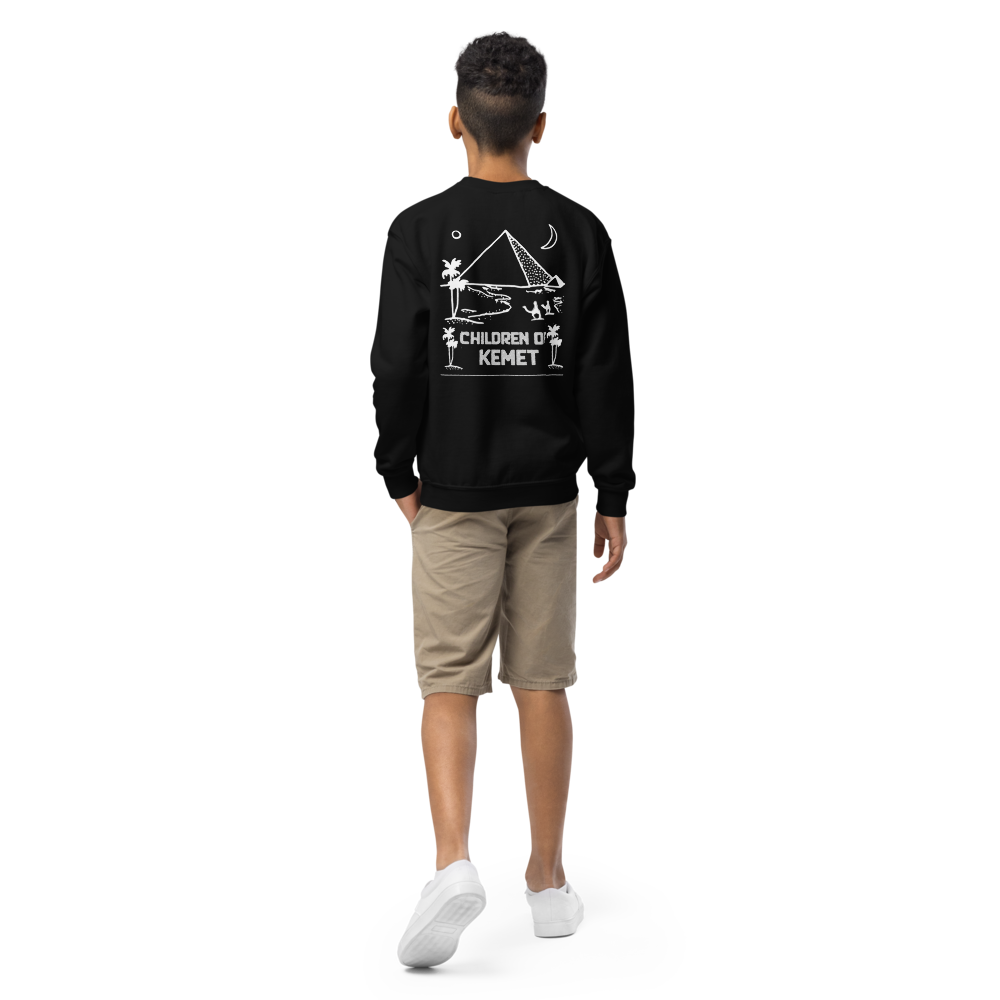 Person wearing a black sweatshirt with a design and text on the back, standing against a white background